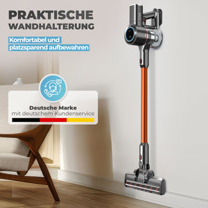 Akkustaubsauger 420 Orange mit praktischer Wandhalterung für platzsparende Aufbewahrung.