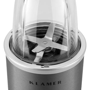 Bullet Mixer close-up showing stainless steel body and sharp blades for blending smoothies and sauces.